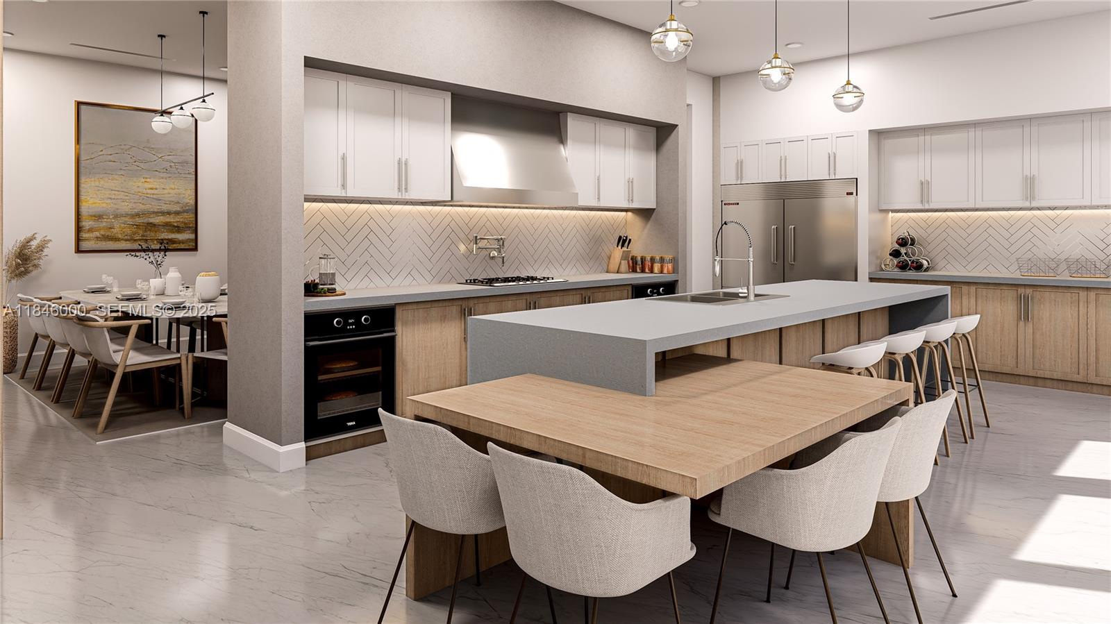 3207 Robbins Road Pompano Beach, FL 33062 - Photo 6 of 12 a kitchen with stainless steel appliances a table chairs and a refrigerator