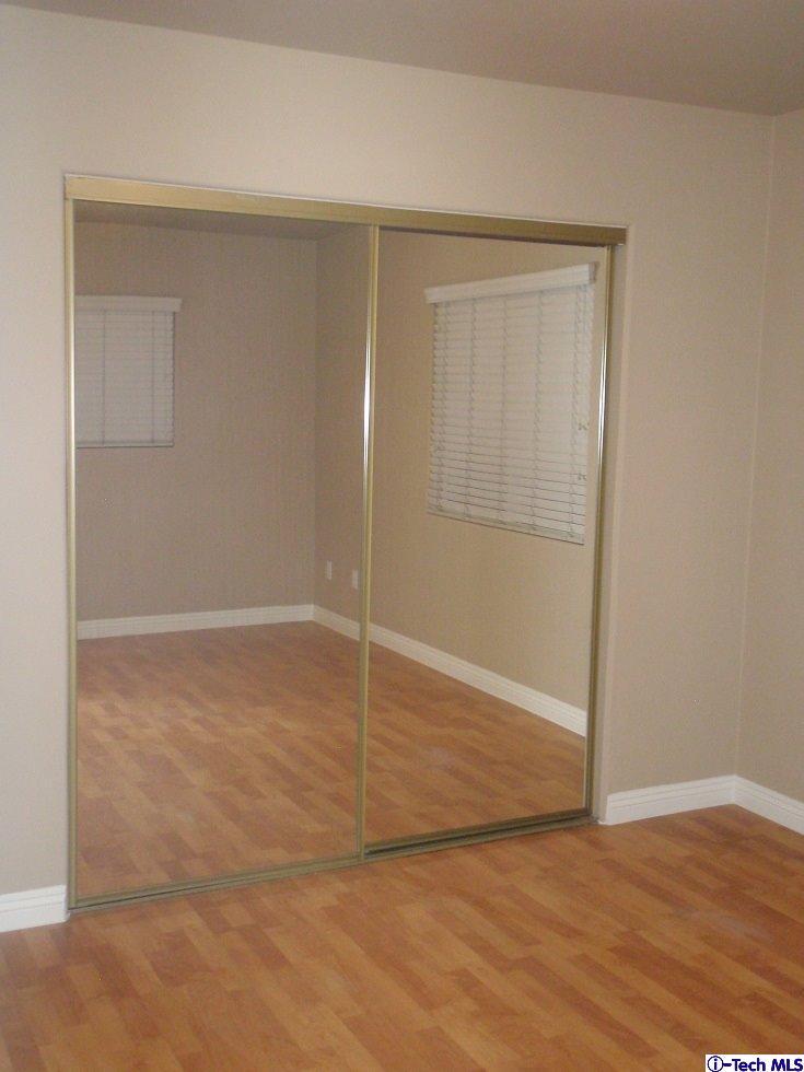 11533 Ranchito Street El Monte, CA 91732 - Photo 26 of 30 a view of an empty room with wooden floor and closet