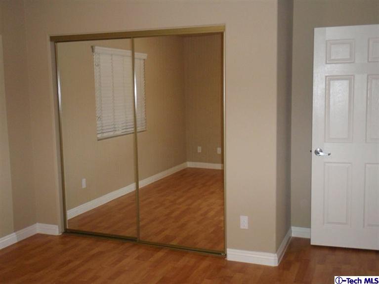 11533 Ranchito Street El Monte, CA 91732 - Photo 6 of 30 a view of empty room with wooden floor