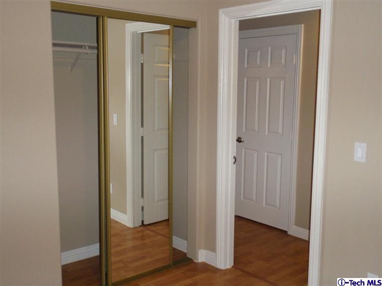 11533 Ranchito Street El Monte, CA 91732 - Photo 10 of 30 a view of a hallway with wooden floor