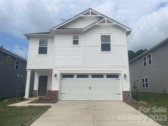 314 Olympia Way York, SC 29745 - Photo 2 of 19 a front view of a house with a yard