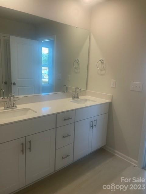 314 Olympia Way York, SC 29745 - Photo 9 of 19 a spacious bathroom with a double vanity sink and a mirror