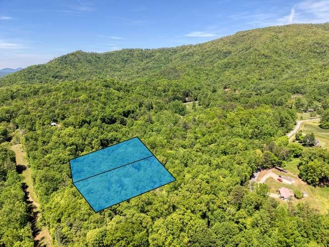 18-19 Sarvis Road Hayesville, NC 28904 - Photo 8 of 12 a view of a field with an outdoor space