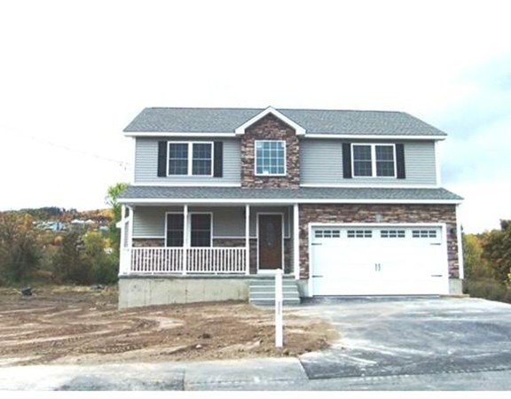 Lot 12 Bethany Road Monson, MA 01057 - Photo 1 of 25 a front view of a house with a yard and garage