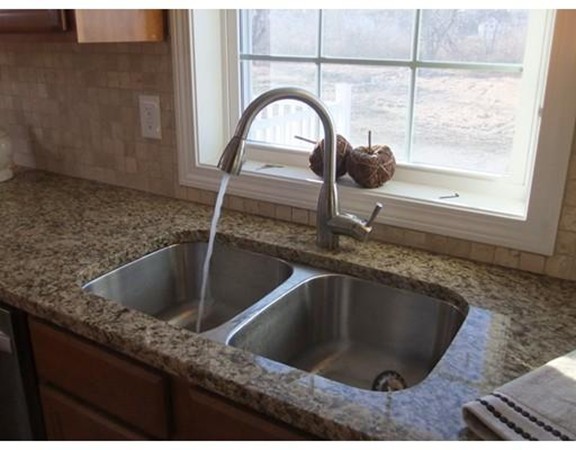 Lot 12 Bethany Road Monson, MA 01057 - Photo 15 of 25 a kitchen with a granite countertop sink and a granite top