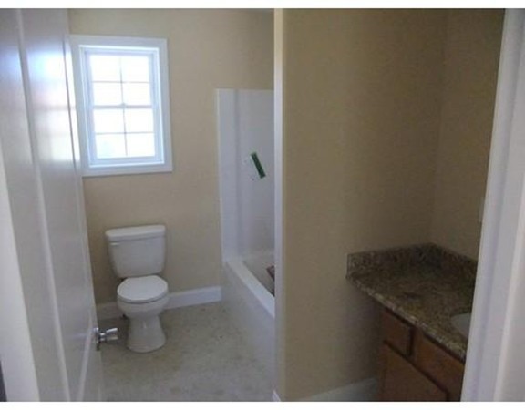 Lot 12 Bethany Road Monson, MA 01057 - Photo 21 of 25 a bathroom with a toilet sink and a window