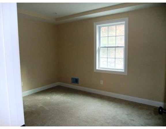 Lot 12 Bethany Road Monson, MA 01057 - Photo 22 of 25 an empty room with a window