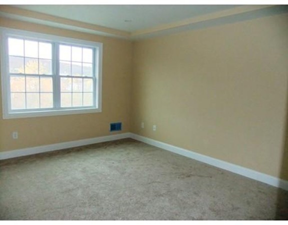 Lot 12 Bethany Road Monson, MA 01057 - Photo 23 of 25 an empty room with a window