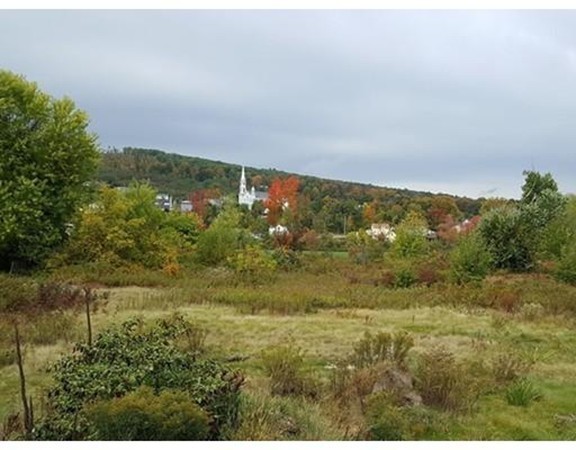 Lot 12 Bethany Road Monson, MA 01057 - Photo 24 of 25 a view of a field with an ocean and trees