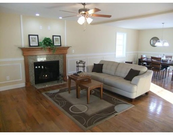 Lot 12 Bethany Road Monson, MA 01057 - Photo 5 of 25 a living room with furniture and a fireplace