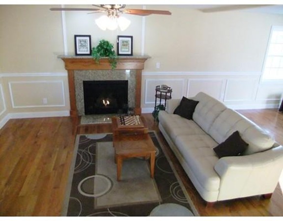 Lot 12 Bethany Road Monson, MA 01057 - Photo 6 of 25 a living room with furniture and a fireplace