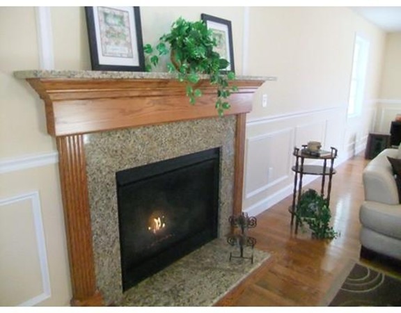 Lot 12 Bethany Road Monson, MA 01057 - Photo 7 of 25 a living room with furniture and a fireplace