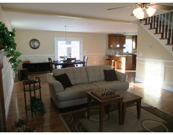 Lot 12 Bethany Road Monson, MA 01057 - Photo 8 of 25 a living room with furniture a large window and a fireplace