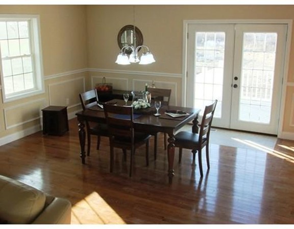 Lot 12 Bethany Road Monson, MA 01057 - Photo 10 of 25 a view of a dining room with furniture window and wooden floor