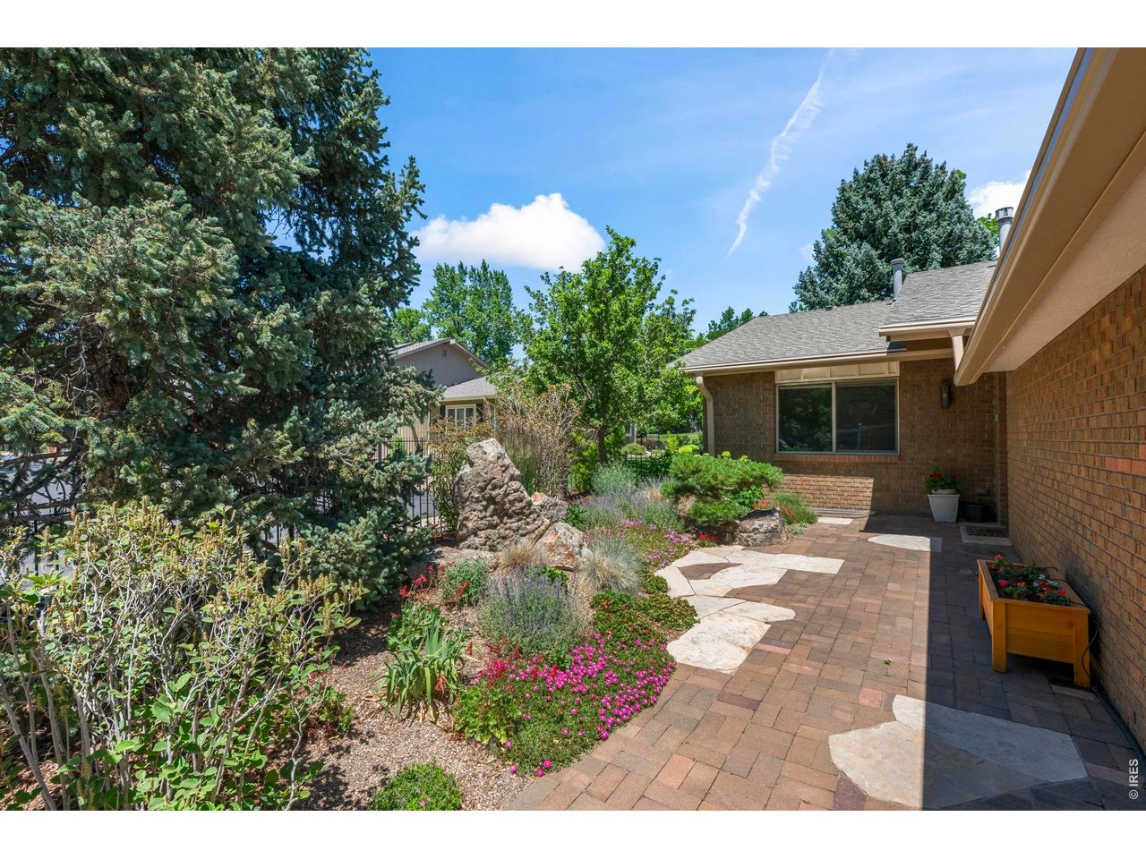 4824 Briar Ridge Court Boulder, CO 80301 - Photo 2 of 40 a view of a backyard with garden