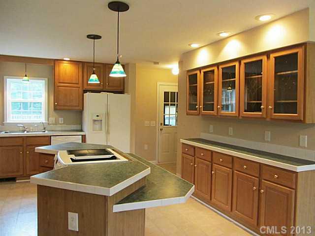 649 White Pine Road Catawba, SC 29704 - Photo 12 of 16 a kitchen that has a sink and a stove in it