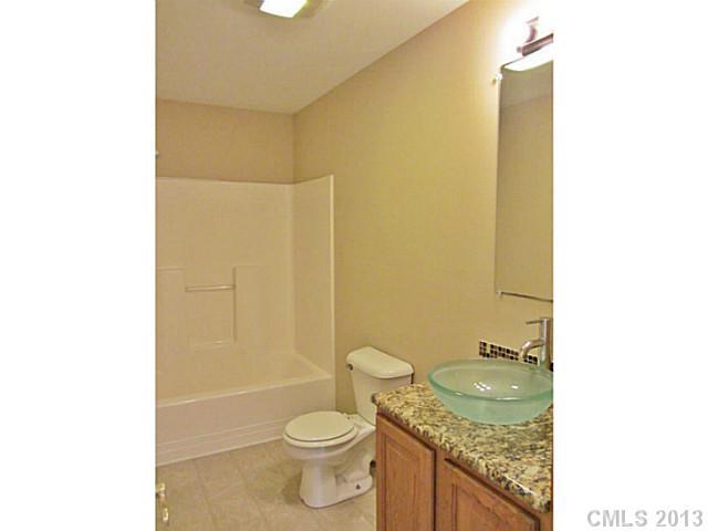 649 White Pine Road Catawba, SC 29704 - Photo 4 of 16 a bathroom with a granite countertop toilet and sink