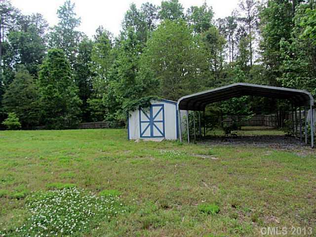 649 White Pine Road Catawba, SC 29704 - Photo 7 of 16 a backyard of a house with lots of green space