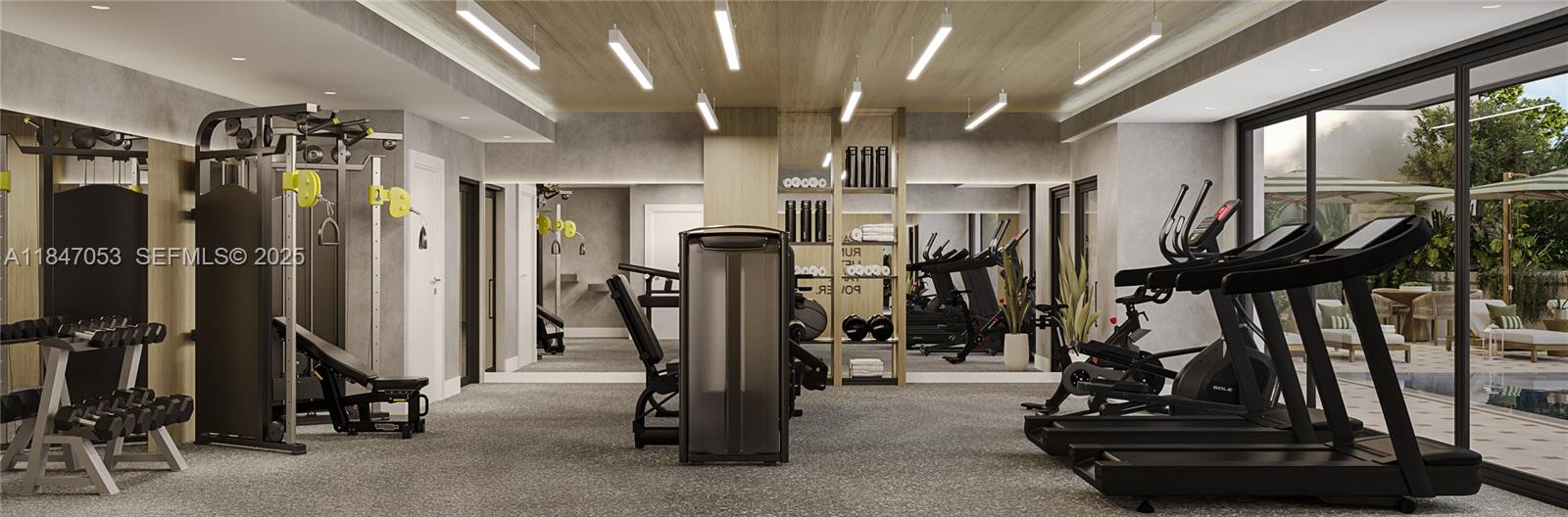 758 Northwest 2nd Street, Unit 503 Miami, FL 33128 - Photo 11 of 16 a view of a room with gym equipment