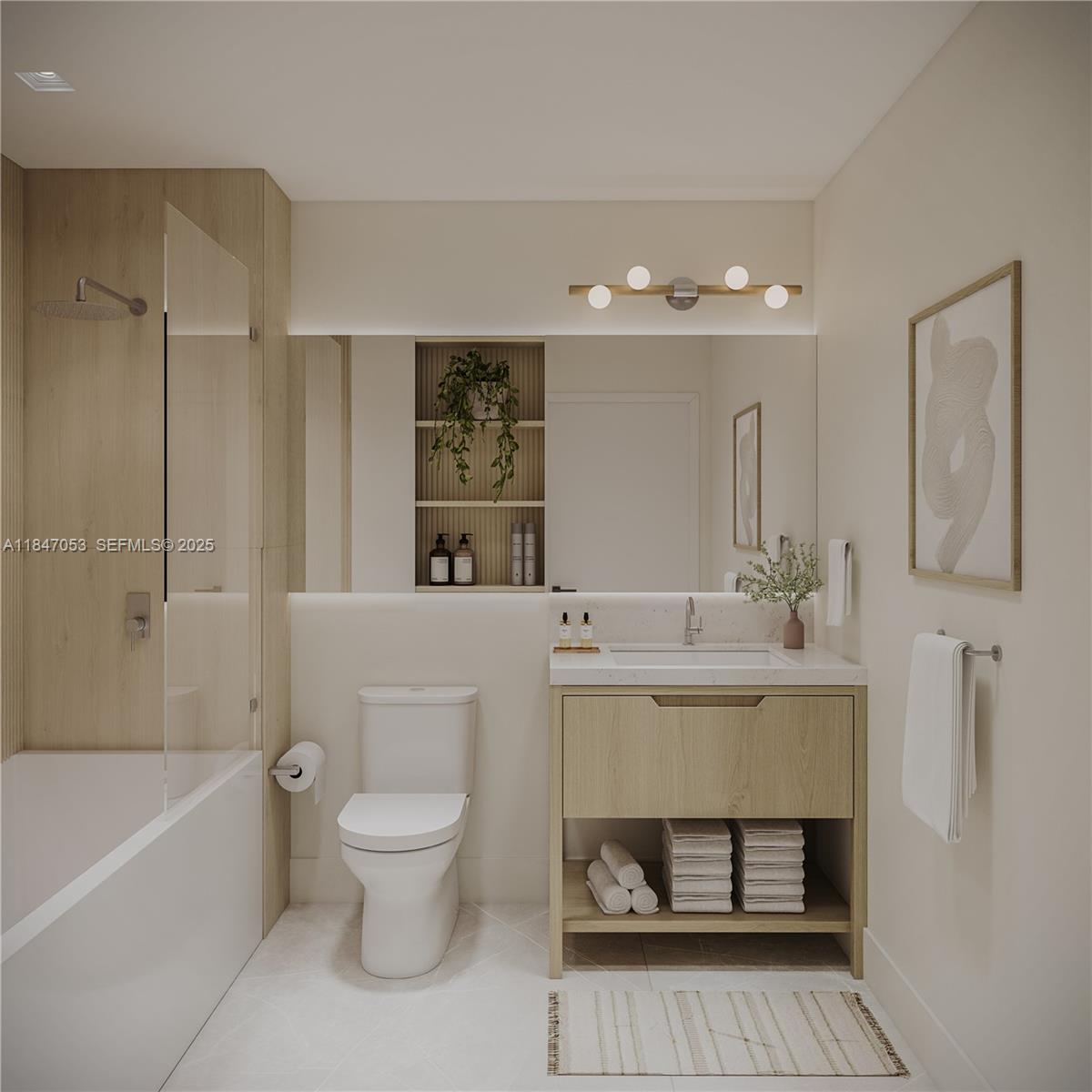 758 Northwest 2nd Street, Unit 503 Miami, FL 33128 - Photo 15 of 16 a bathroom with a sink a toilet and a bathtub