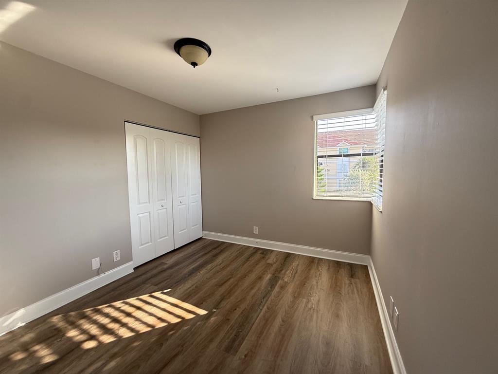 5781 Riverside Drive, Unit 201 Coral Springs, FL 33067 - Photo 5 of 23 a view of an empty room and window