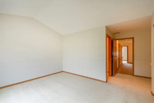 an empty room with a bathroom