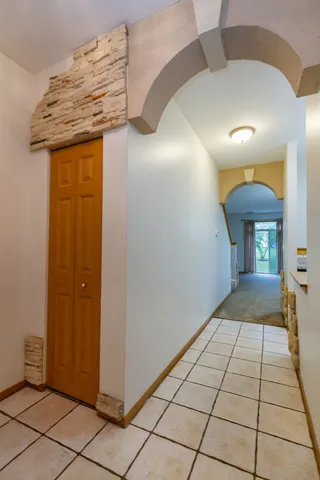 a view of a hallway to the house