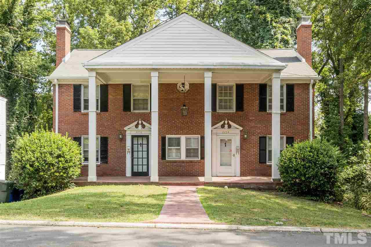 2254 The Circle Raleigh, NC 27608 - Photo 1 of 22 a front view of a house with a yard