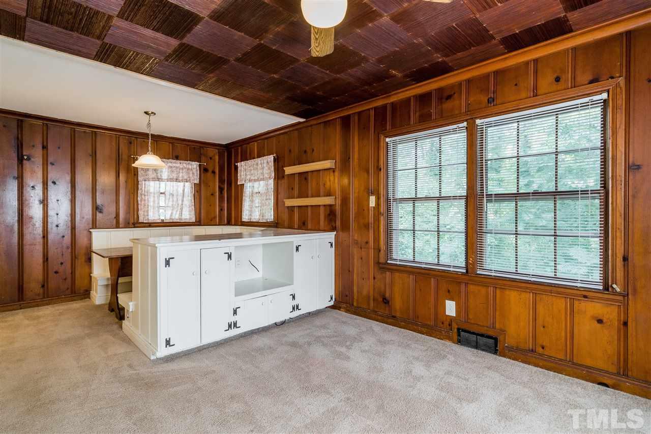 2254 The Circle Raleigh, NC 27608 - Photo 15 of 22 a view of an empty room with window and cabinet