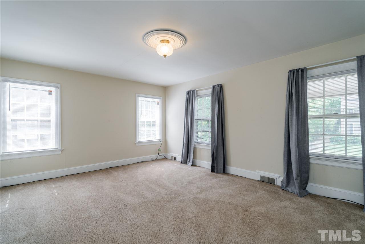 2254 The Circle Raleigh, NC 27608 - Photo 16 of 22 an empty room with windows