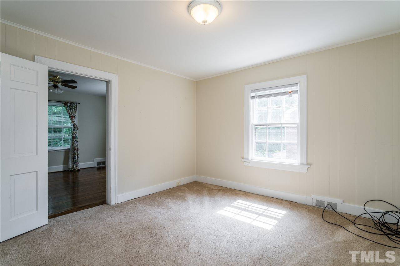 2254 The Circle Raleigh, NC 27608 - Photo 18 of 22 an empty room with windows