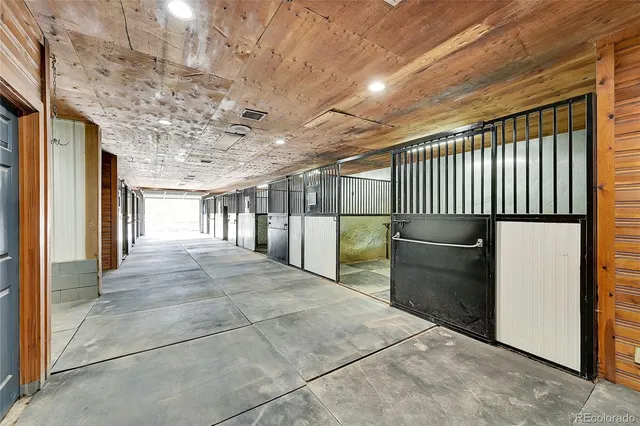 a view of a hallway with a chair