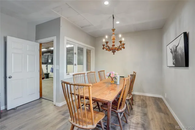 walk in closet with white walls