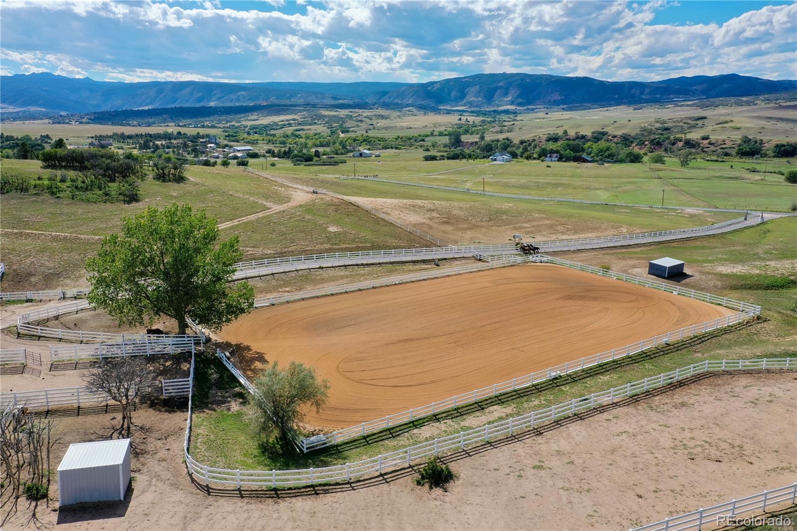 810 North Perry Park Road Sedalia, CO 80135 - Photo 38 of 46 a view of a tennis court