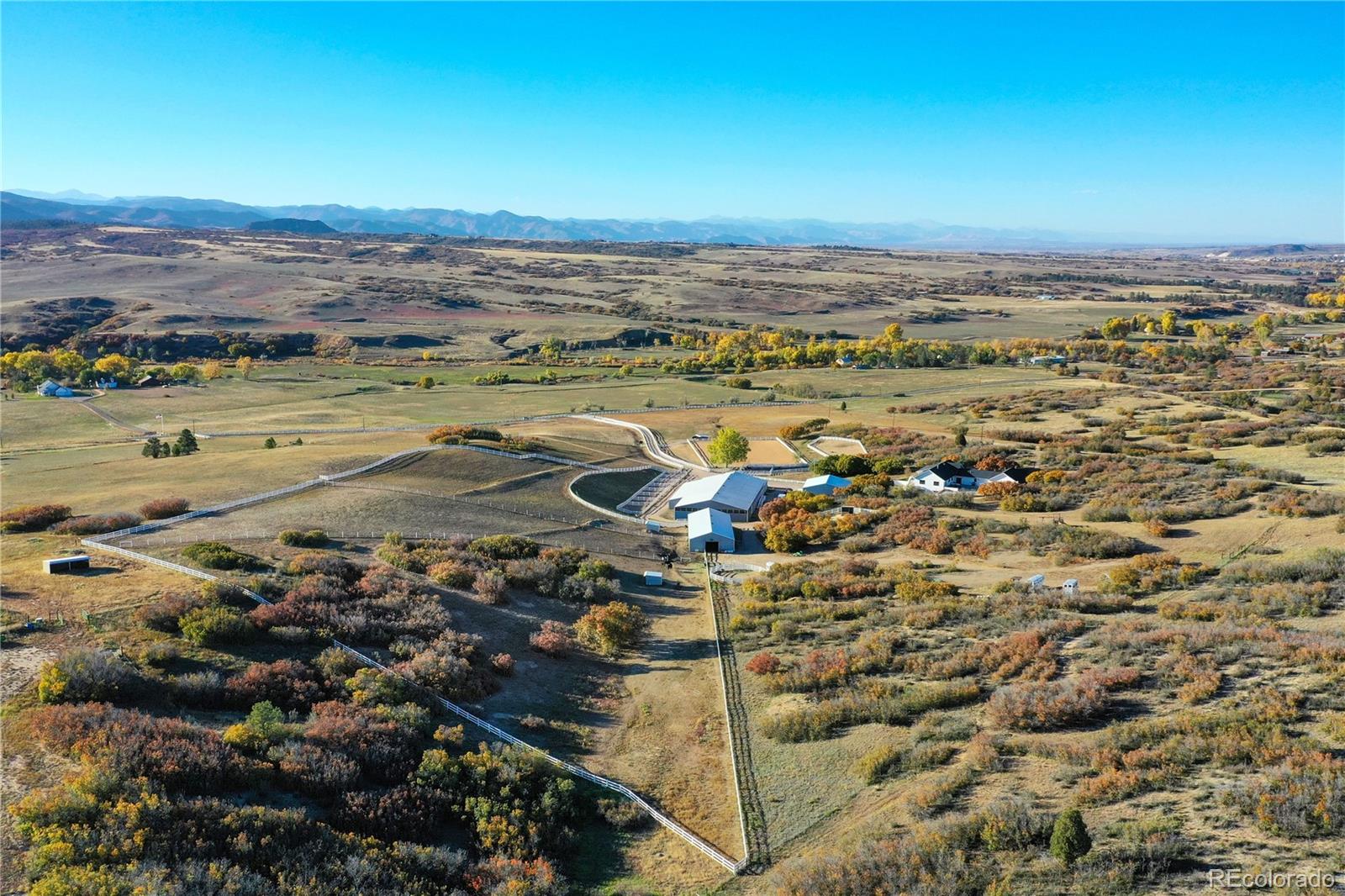 810 North Perry Park Road Sedalia, CO 80135 - Photo 4 of 46 an aerial view of residential building and ocean