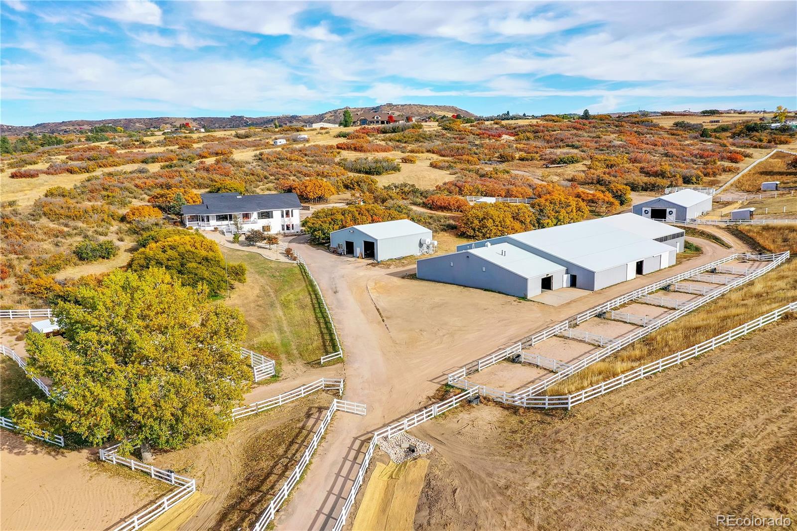 810 North Perry Park Road Sedalia, CO 80135 - Photo 43 of 46 an aerial view of residential building and ocean