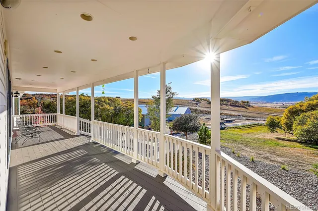 a view of a balcony with lake view