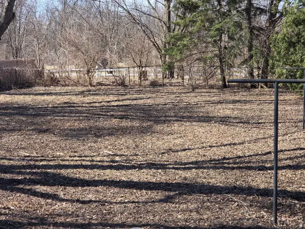 a view of an empty room with sliding door