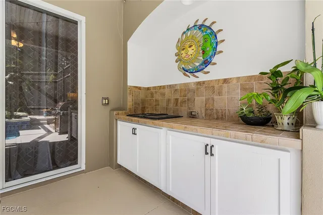 a view of a backyard with a patio