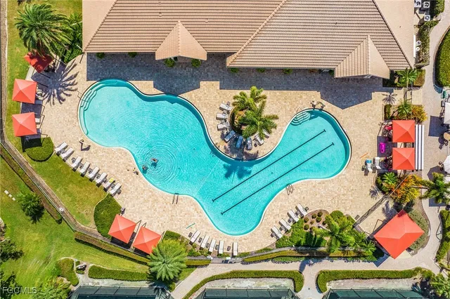 a view of a bathroom with a tub and shower