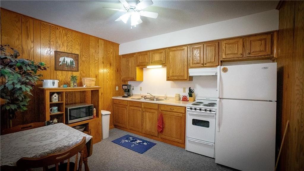 138 Shannon Road Renfrew, PA 16053 - Photo 21 of 25 a kitchen with stainless steel appliances a stove a refrigerator and cabinets