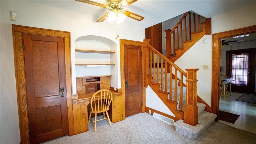 138 Shannon Road Renfrew, PA 16053 - Photo 10 of 25 a view of staircase with furniture and a chandelier