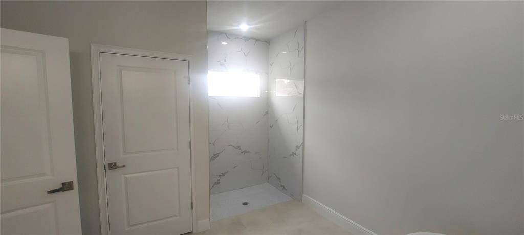 2673 Southwest 156th Place Ocala, FL 34473 - Photo 13 of 14 a bathroom with a shower