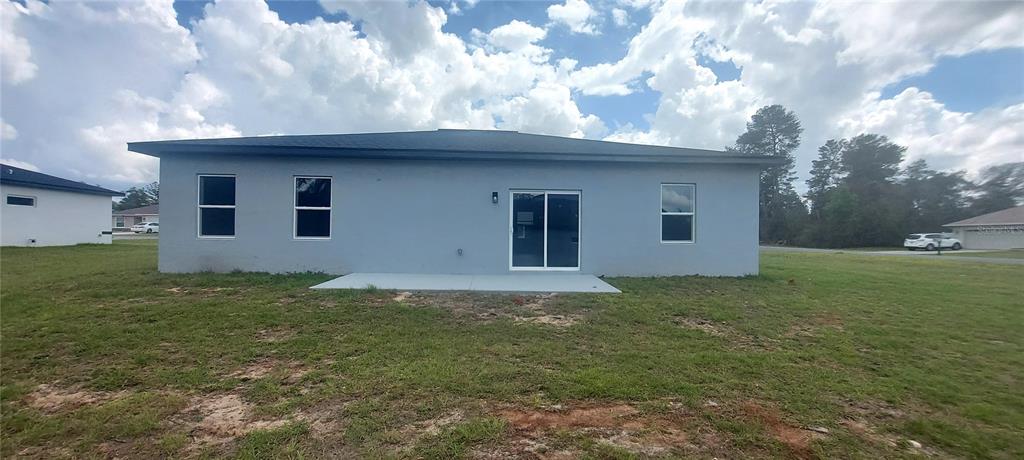 2673 Southwest 156th Place Ocala, FL 34473 - Photo 4 of 14 a house view with a garden space