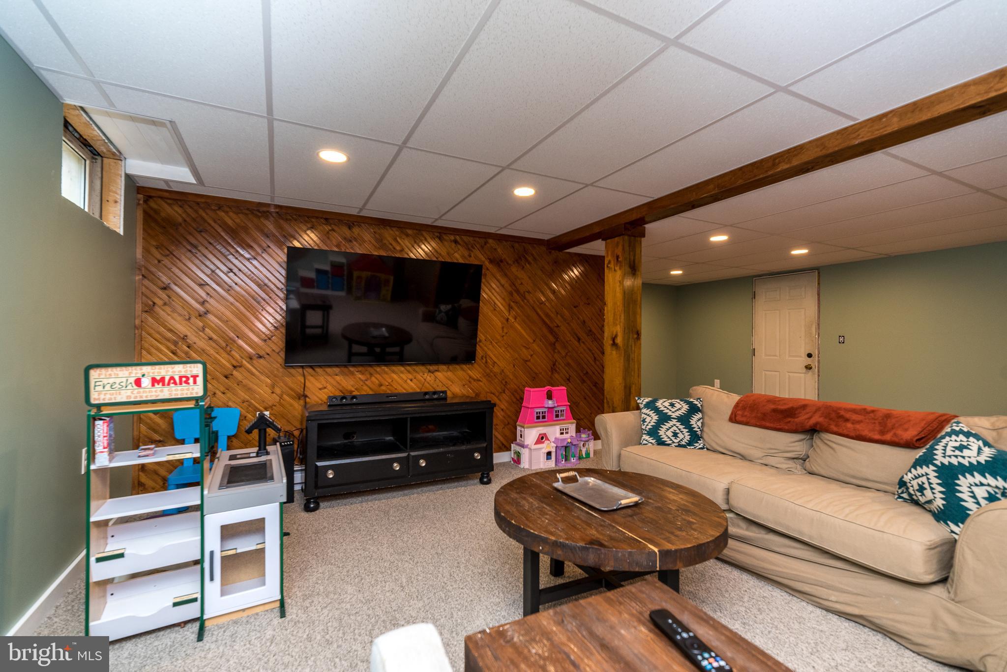 568 Kulp Road Perkiomenville, PA 18074 - Photo 24 of 34 Finished basement family room area