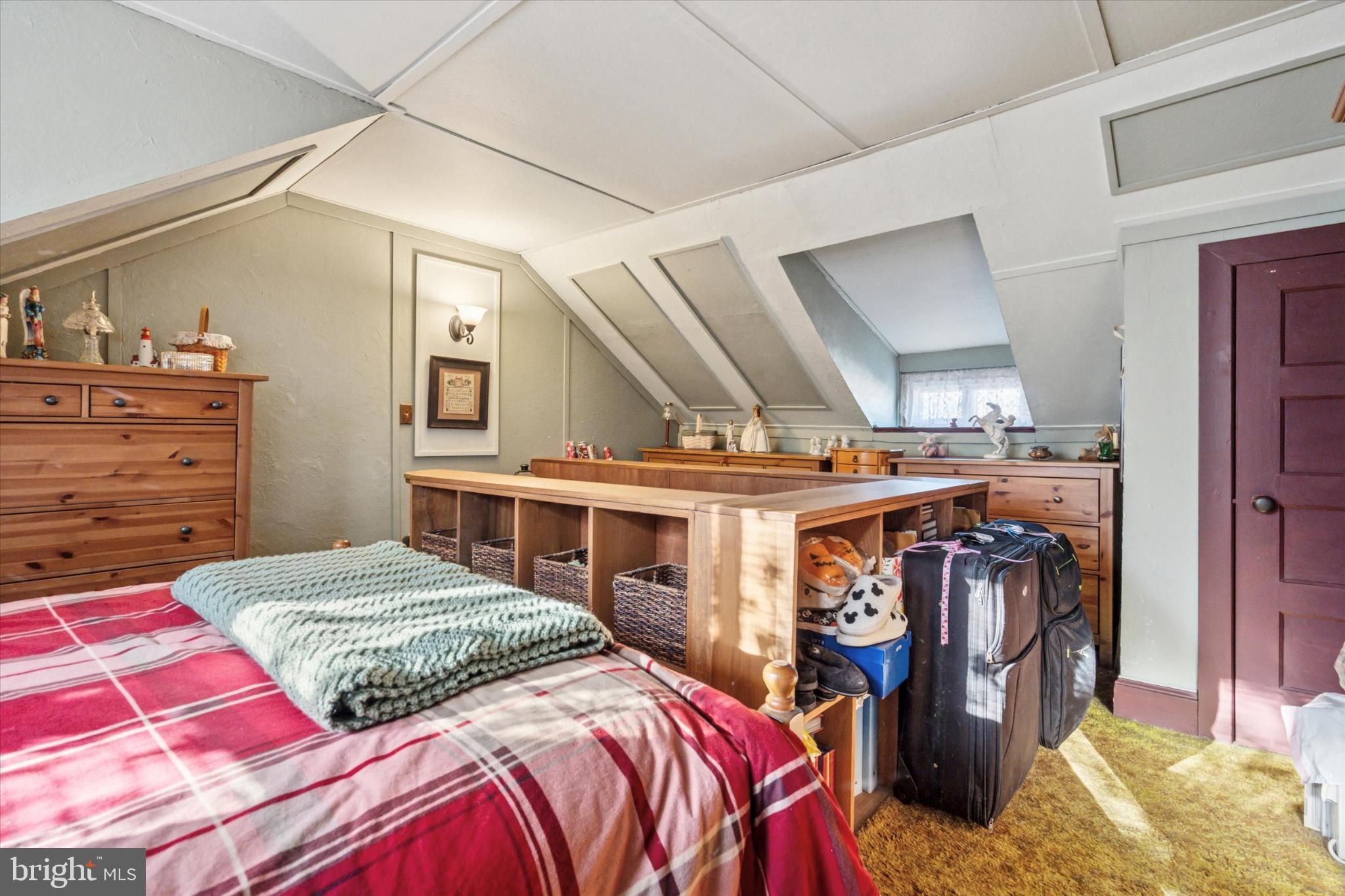 243 Monroe Street Bristol, PA 19007 - Photo 11 of 15 a bedroom with a bed and walk in closet