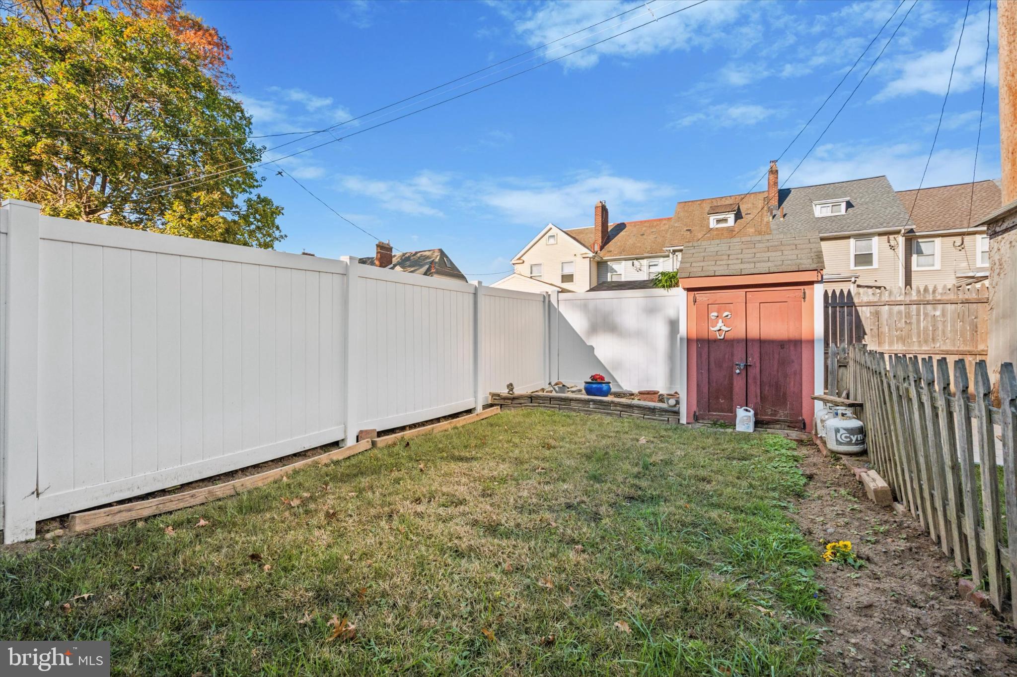243 Monroe Street Bristol, PA 19007 - Photo 15 of 15 a view of a back yard of the house
