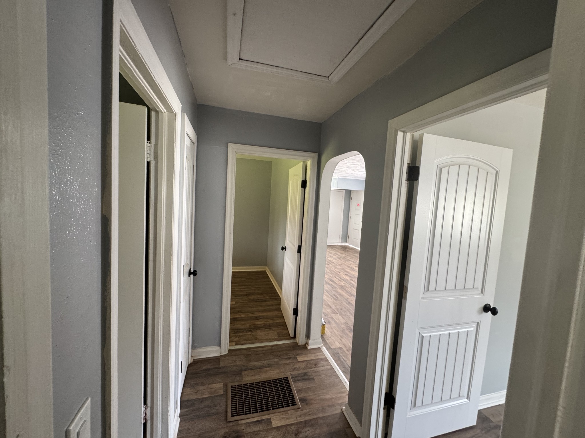 402 East Locust Street Princeton, KY 42445 - Photo 25 of 32 a view of a hallway with wooden floor and staircase