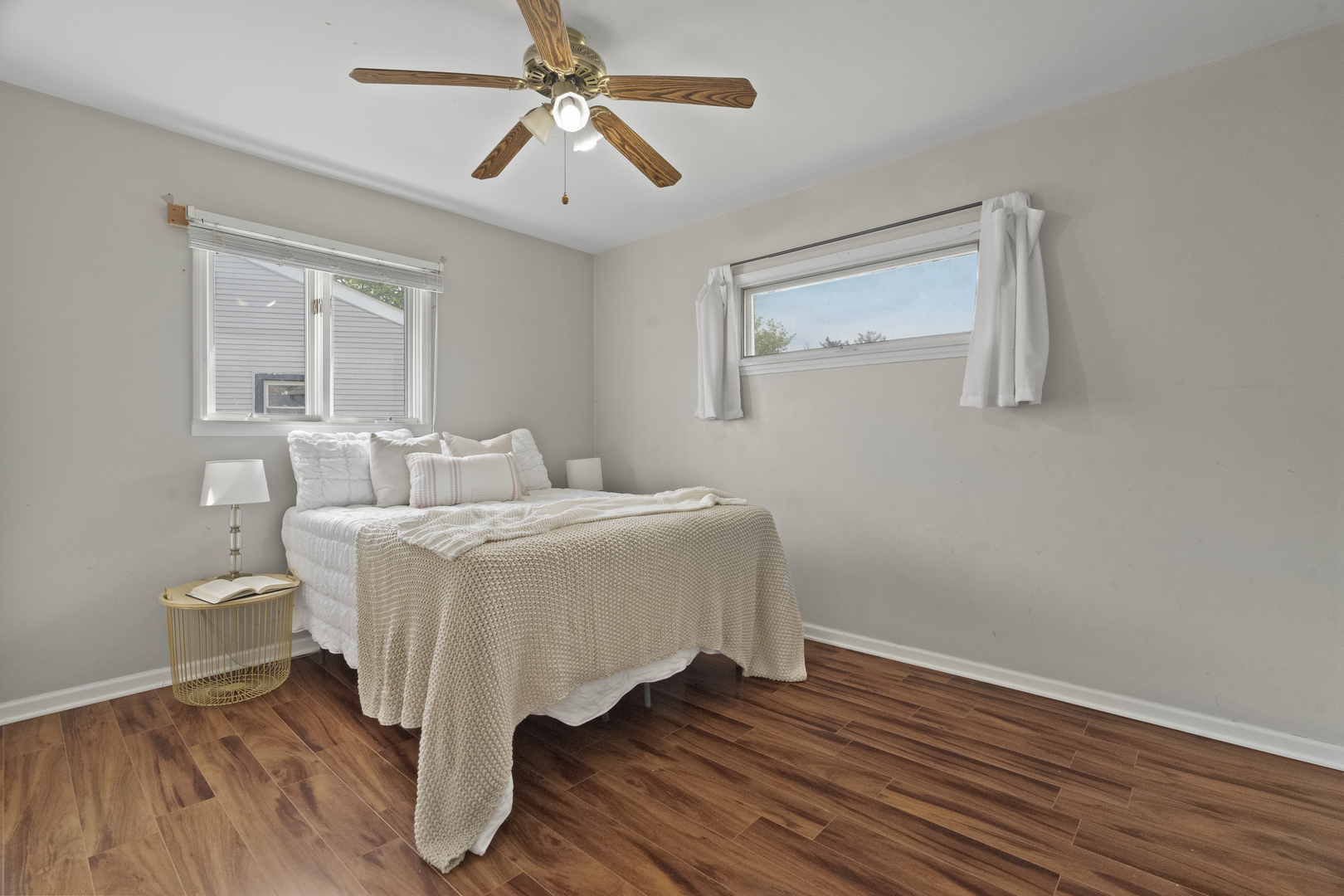 2832 Osage Circle Waukegan, IL 60087 - Photo 12 of 21 a bedroom with a bed and wooden floor
