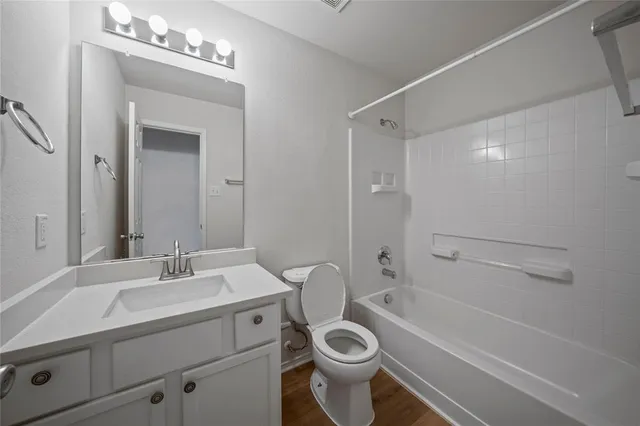 a bathroom with a sink toilet a shower and bathtub